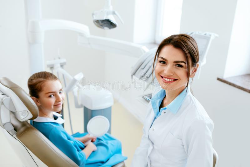 dentistry dentist doctor patient clinic female little light dental high resolution 115998811 Inspiring Excellence 2022